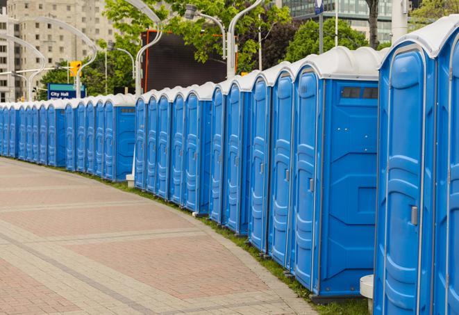 colorful portable restrooms available for rent at a local fair or carnival in Arcadia